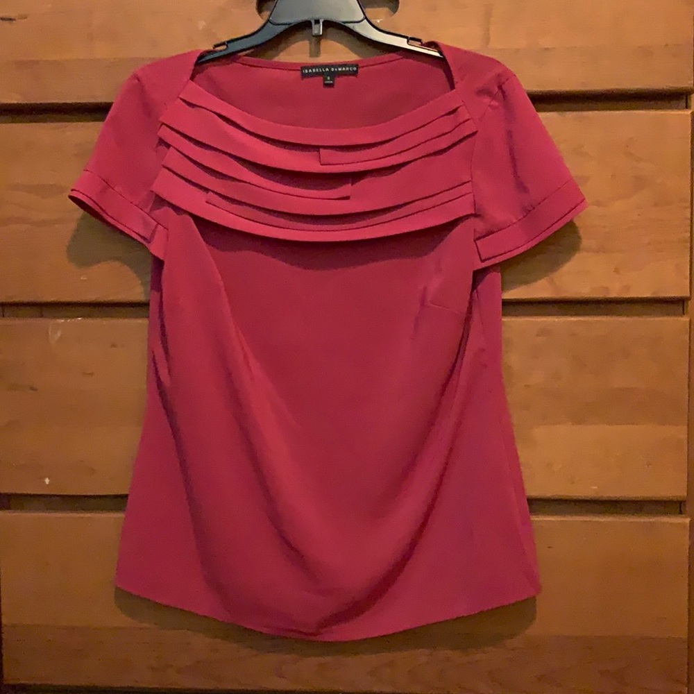 Isabella De Marco pink shirt sleeved blouse with stacked pleated detail at neck.